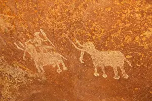 Madhya Pradesh Prints: Man riding elephant, Bhimbetka Rock Shelters, Raisen, Madhya Pradesh, India
