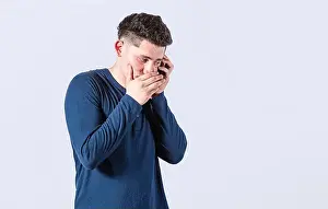 Man secretly talking on the phone