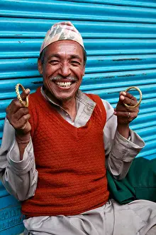 Jewellery Prints: Man selling jewellery at the central market in Gangtok, Sikkim, India