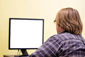 Concentrating Prints: A Man staring at a blank screen