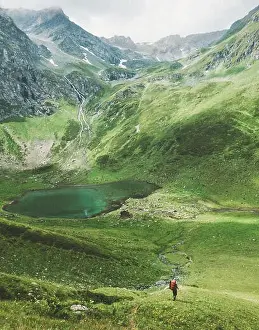 Man traveler mountaineering Travel adventure active lifestyle concept lake