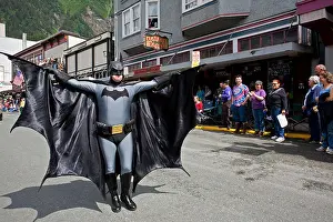 Disguised Prints: Man wearing a Batman disguise. 4th July parade. Juneau. Alaska. USA