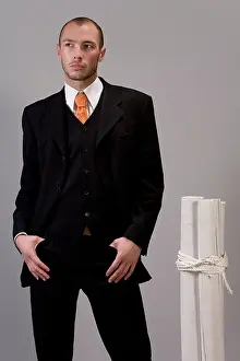 Well Dressed Prints: Man wearing suit standing with hands in pockets