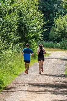 Jogging Prints: a man and woman or husband