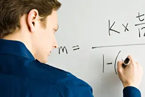 Whiteboard Prints: Man writing equation on whiteboard