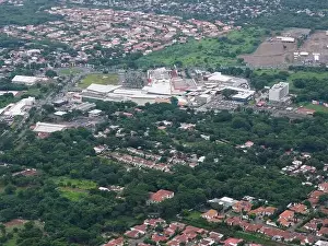Managua Prints: Managua, Nicaragua -August 14, 2024: Managua city aerial landscape with big shopping center