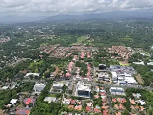 Managua, Nicaragua - August 16, 2024: Business district in Managua city aerial drone view