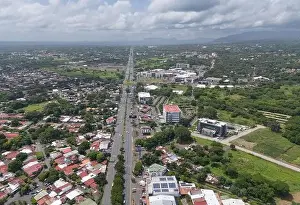 Managua Prints: Managua, Nicaragua - August 16, 2024: Wide cityscape of Managua town aerial drone view