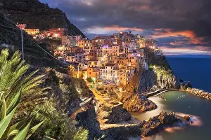 Manarola, La Spezia, Italy coastal view in Cinque Terre at dawn