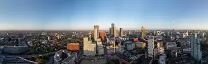 Airy Prints: Manchester aerial cityscape showcases the towering skyscrapers near Deansgate square under the clear blue sky