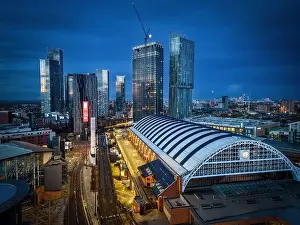Beetham Tower Prints: Manchester City Centre skyline at dawn with city lights and dark skies of this English city