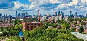 Elizabeth Tower Prints: Manchester Skyline panoramic view showing red brick old warehouse and chimney. fault