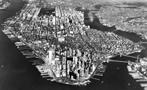Under Construction Prints: Manhattan Island showing at the left foreground the incomplete World Trade Center
