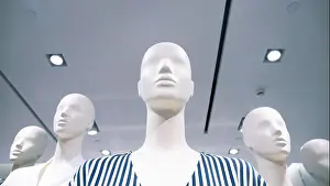 Blouse Prints: Mannequin with white face wearing striped blouse
