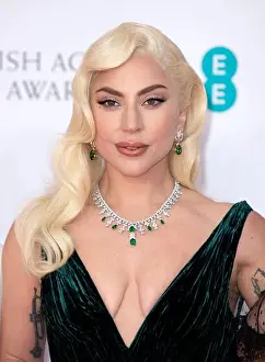 Mid Length Prints: March 13th, 2022, London, UK. Lady Gaga arriving at the EE British Academy Film Awards