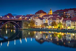 Maribor, Slovenia. Cityscape image of Maribor, Slovenia during autumn twilight blue hour with reflection of the city in Drava River