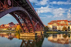 Maribor, Slovenia. Cityscape image of Maribor, Slovenia during autumn day with reflection of the city in Drava River