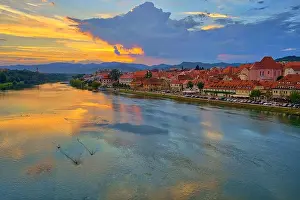 Maribor, Slovenia, Europe. Popular riverbank Lent by the river Drava. Beautiful sunset scenery