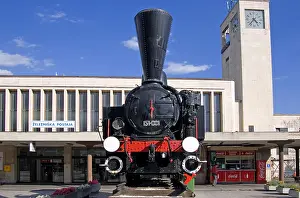 Styria Prints: Maribor, Stajerska, Slovenia. Old Steam Engine on permanent display outside the main railway station