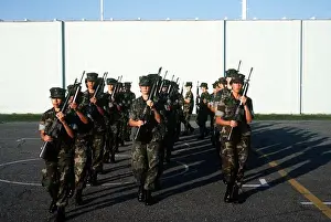 Marine Corps Prints: The Marine Corps first all-woman drill platoon performs a close order drill