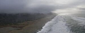Images Dated 31st December 2020: The marine layer drifts over a scenic beach in Klamath, Northern California