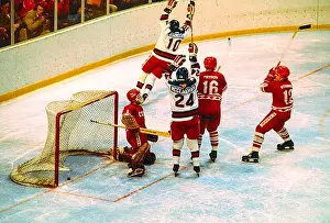1980 Prints: Mark Johnson #10 Team USA celebrates scoring a tying goal in the third period against USSR goalie Vladimir Myshkin