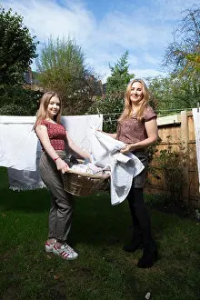 Married couple sharing domestic chores at home, England, UK