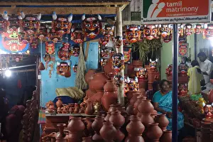 Talisman Prints: Mask vendor seeling masks that ward off the evil eye