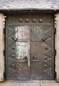 Entering Prints: Massive old door in courtyard of famous Saint Stephen's cathedral in Passau