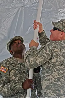 Master Sgt. Anthony Webb and Chief Warrant Officer Larry Frontz