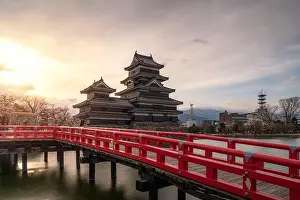 Matsumoto Castle during cherry blossom (Sakura) is one of the most famous sights in Matsumoto, Nagano, Japan. Asian tourism, history building, or trad