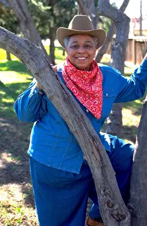 Citizens Prints: Mature Black African American cowgirl age 72 dressed up for inner city youth rodeo fundraiser