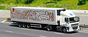 Supply Chain Prints: McDonalds advert for free range eggs on store supply chain delivery trailer behind lorry truck driving along UK m25