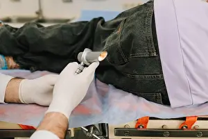 Inflammation Prints: Medical anorectal examination with proctologist using exam light