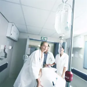 Hurry Prints: Medical team moving patient on gurney