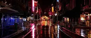 Melancholy Prints: Melbourne City Bourke street mall tramlines on a wet night full of blurry reflections