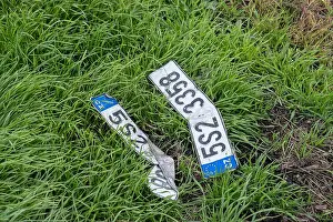Discarded Prints: Melnik, CZ - 03 October 2022: vehicle registration numbers abandoned on field
