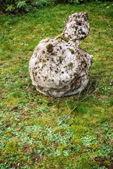 Melted Prints: melting old snowman in warm garden