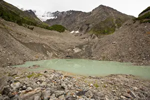 Snout Prints: A meltwater lake at the snout of the rapidly retreating Bionnassay glacier coming off the Mont Blanc range