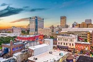 Memphis, Tennessee, USA downtown city skyline over Beale Street after sunset