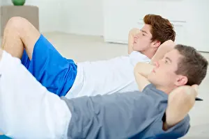 Crunch Prints: Two men doing sit-ups