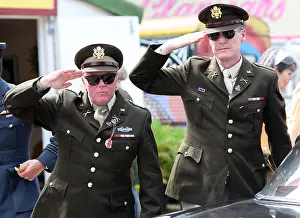 Motor Sport Prints: Men dressed in US military uniforms salute - Goodwood Revival Meeting 2011