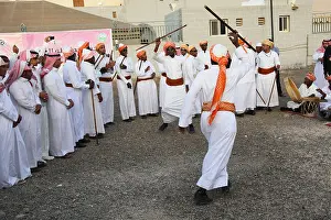 Riyadh Prints: Men fight in traditional dress Janadriya Festival Riyadh Saudi Arabia