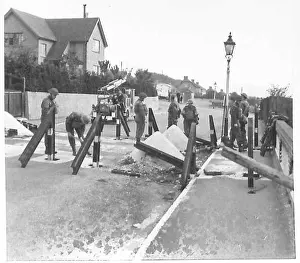 Practice Prints: Men of the Home Guards erecting street barricades during a large-scale invasion exercise in Southern Command