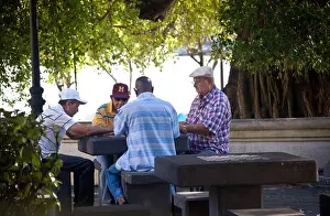 San Juan Prints: Men playing dominoes in a shady public park in Old San Juan, Puerto Rico