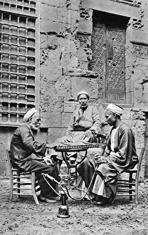 Cairo Prints: Men relaxing, Cairo, Egypt, c1922. Artist: Donald McLeish