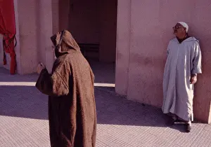 Berber Prints: Men wearing jellaba in the medina souk of Marrakech Marrakesh in Morocco in the Maghreb in North Africa Sahara