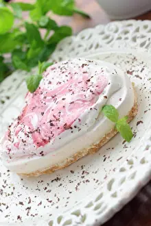 Meringue shaped heart on a ornamental plate