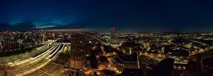 Footage Prints: A mesmerizing view of Leeds city skyline illuminated at night