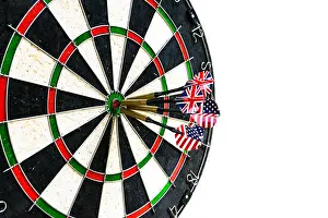 Throw Prints: Metal darts have hit the red bullseye on a dart board